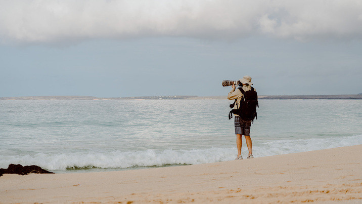 Andrew taking photos in the Galapagos